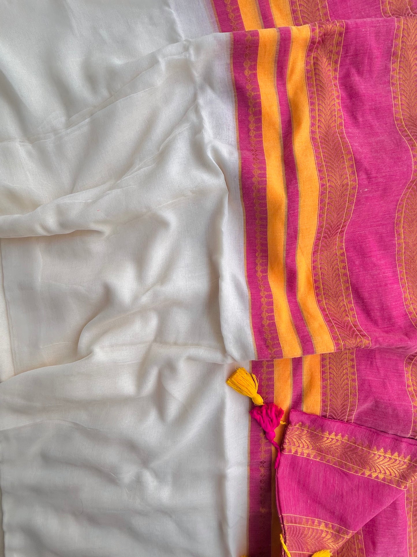 Off white mul cotton saree with zari border