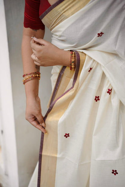 Kasavu saree in floral embroidery - maroon