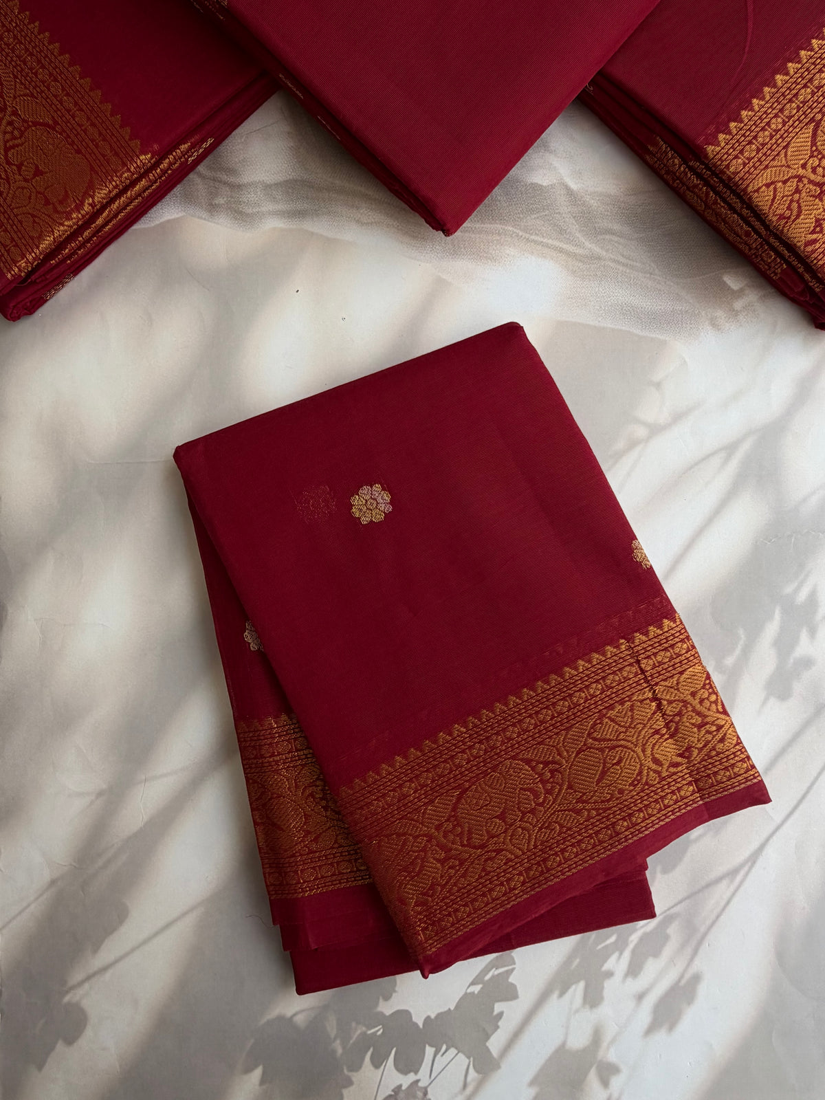 Kanchi cotton saree with butta weaves & zari pallu - maroon