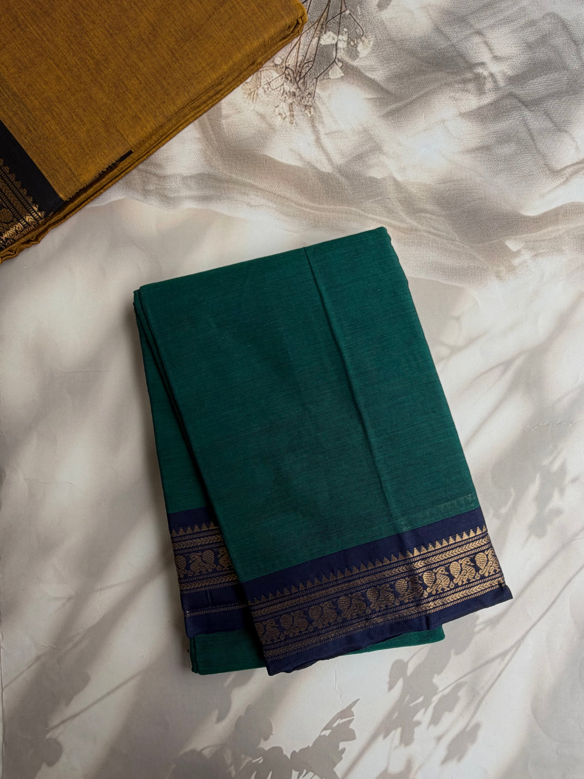 Kanchi cotton saree with zari weaves peacock green