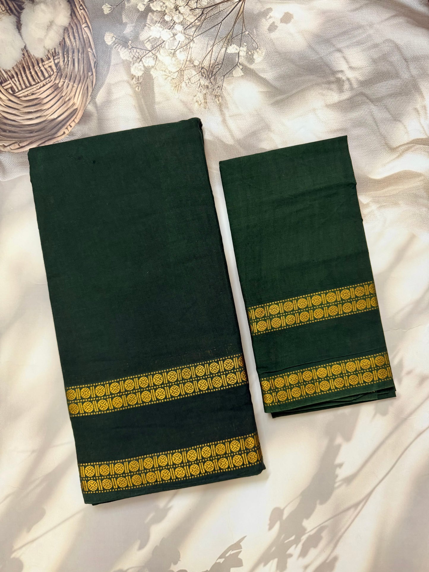Sungudi saree with minimal zari border dark green