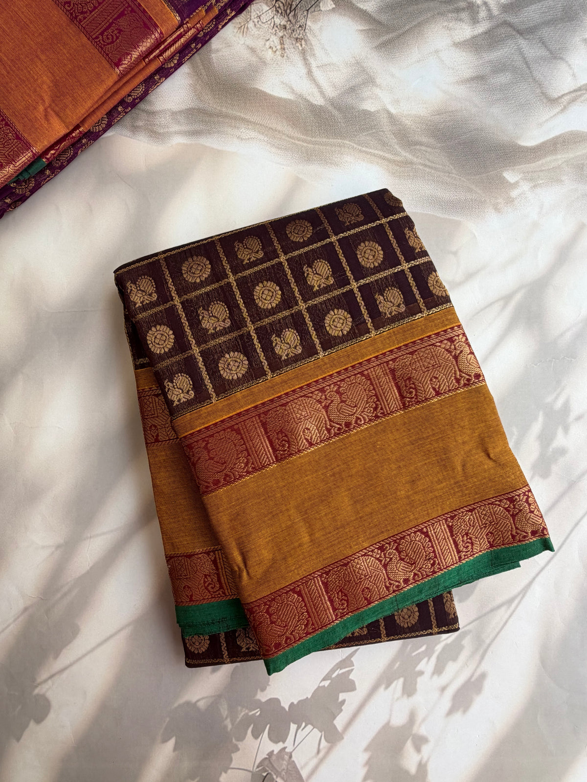 Kanchi cotton saree in 1000 buttas & zari check weaves with grand pallu brown