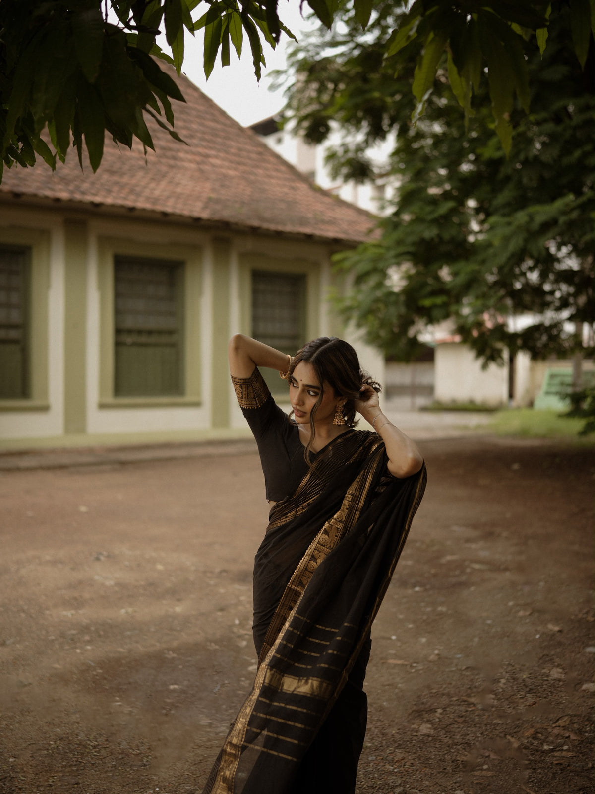 Black Kanchi cotton saree with zari lines border