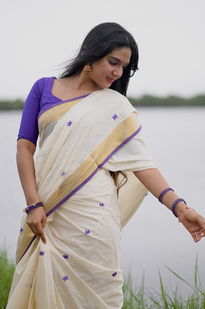 Kasavu saree in lotus embroidery - Russian violet
