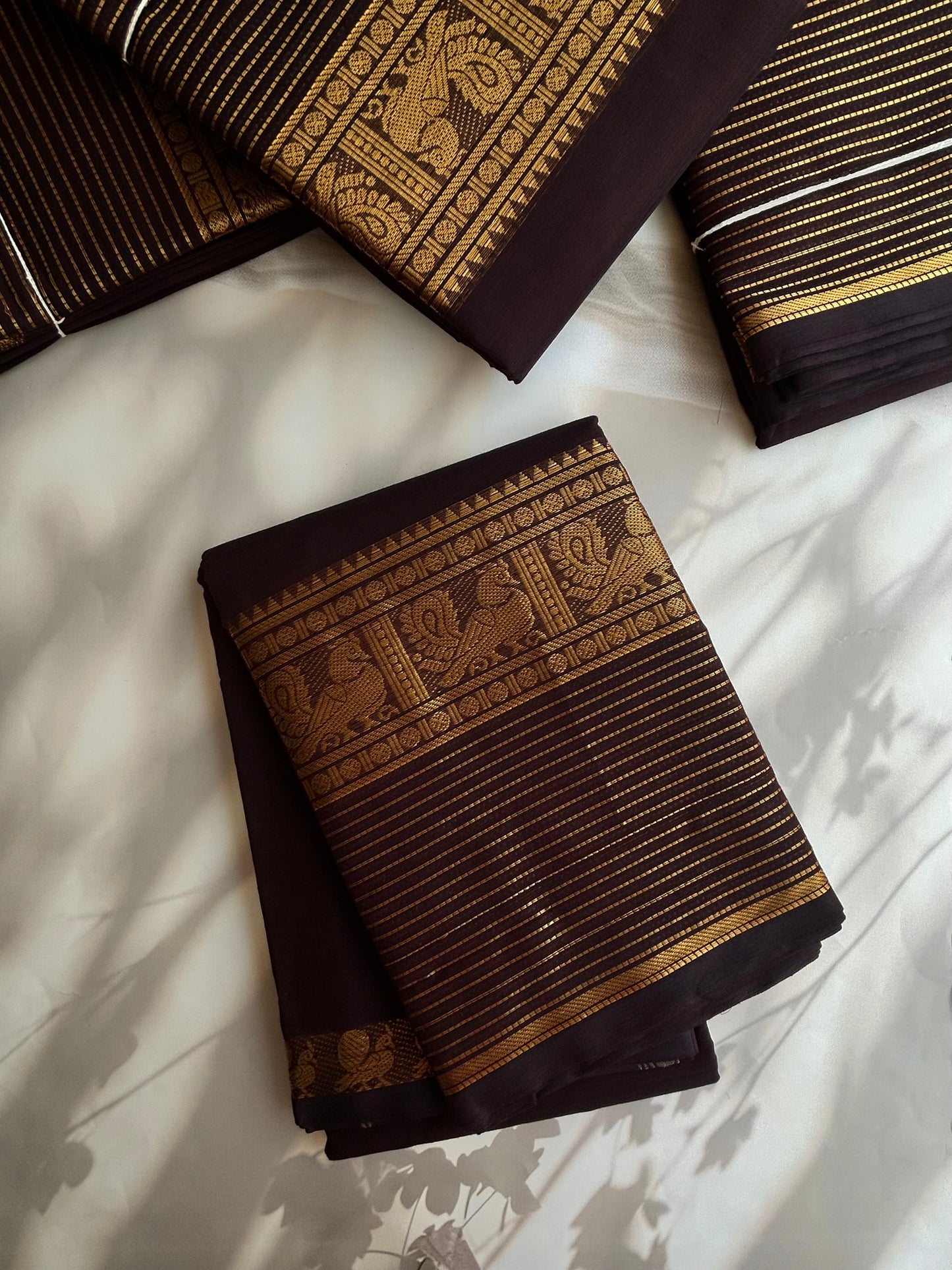 Brown Kanchi cotton saree with zari lines border