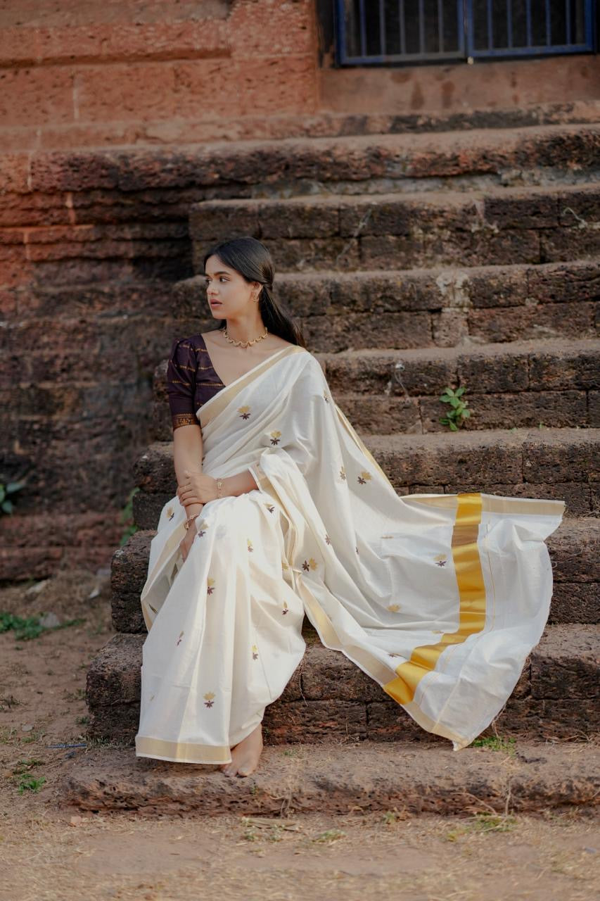 Kasavu saree in lotus embroidery