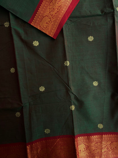 Kanchi cotton saree with butta weaves & zari pallu dual tone green