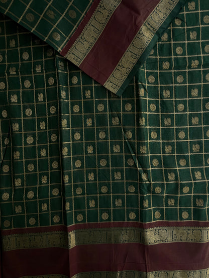 Kanchi cotton saree with checks & butta weaves with a grand pallu - green