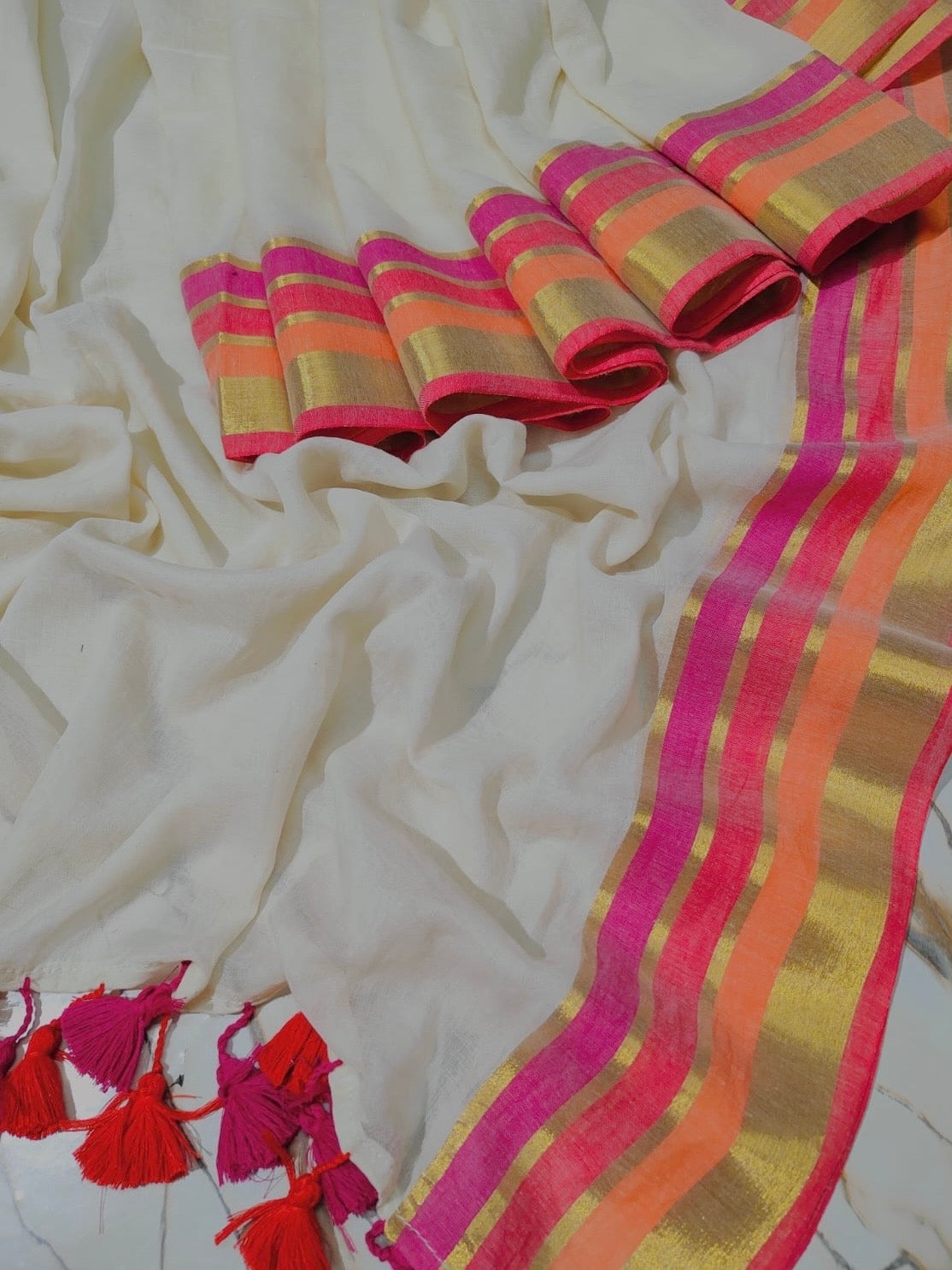 Off white Mul mul saree with zari borders
