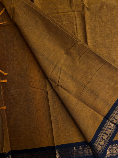 Mustard Kanchi cotton saree with minimal zari black border