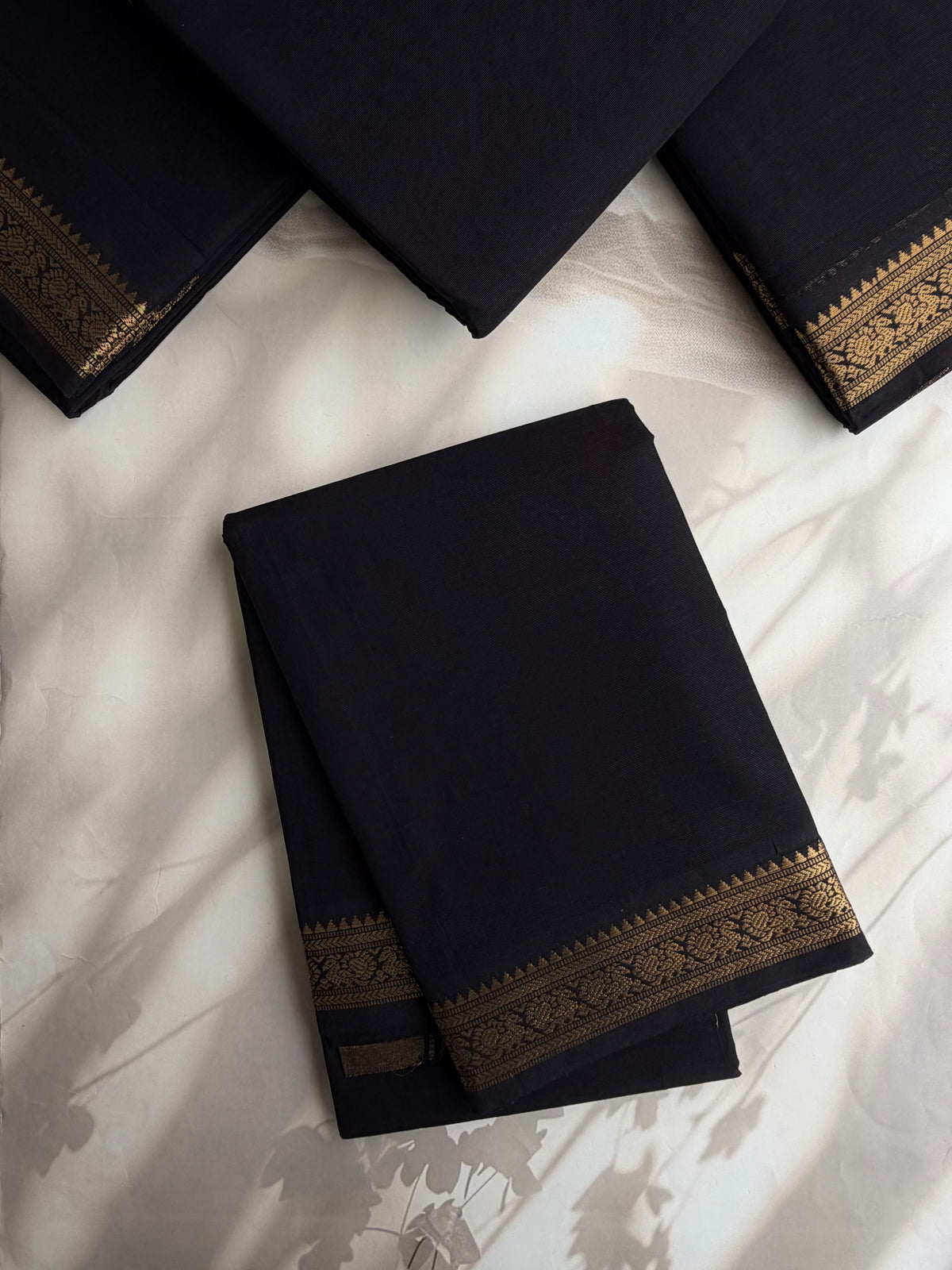 Kanchi cotton saree with minimal zari border black