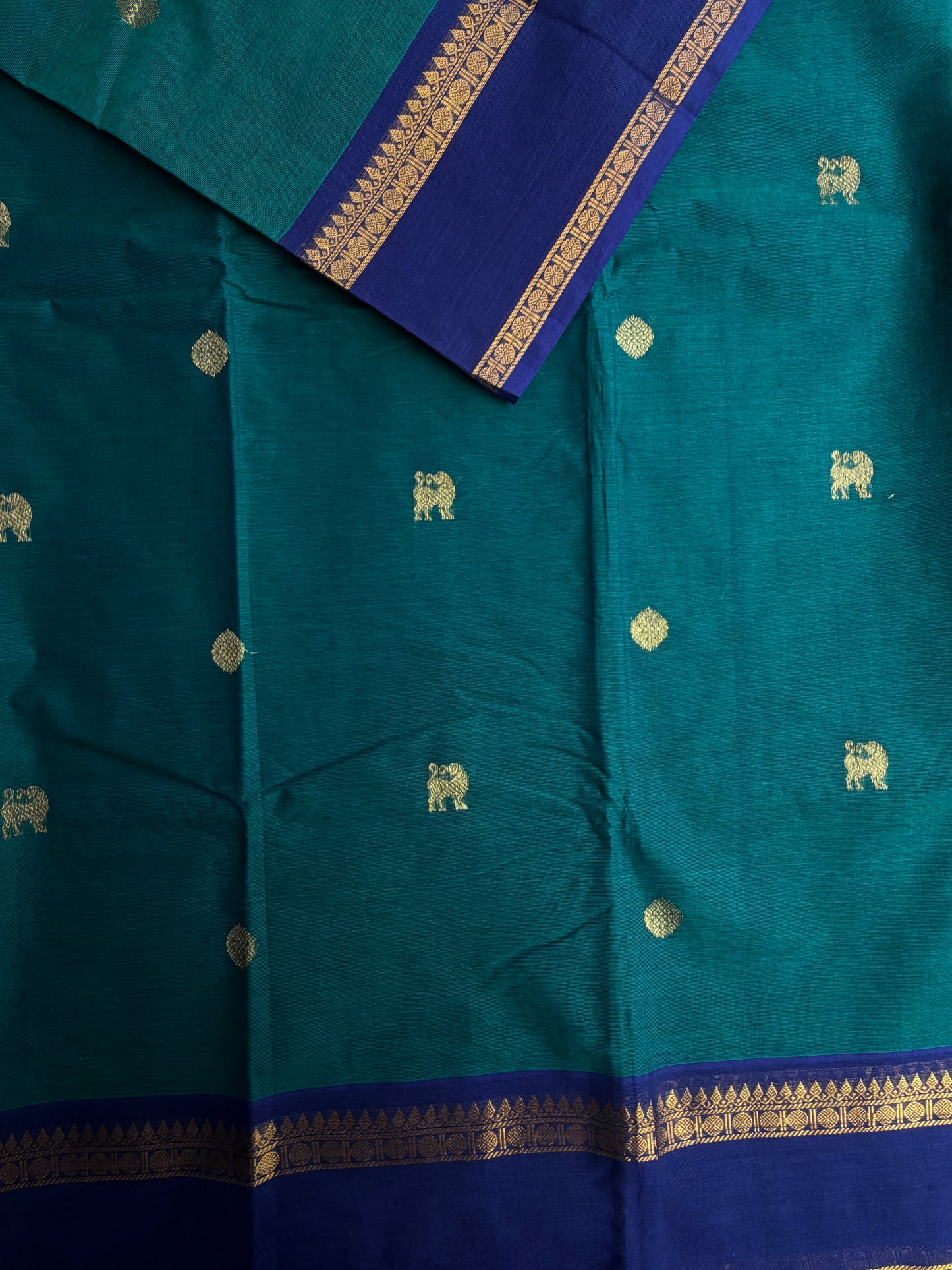Kanchi cotton saree with butta weaves & zari pallu