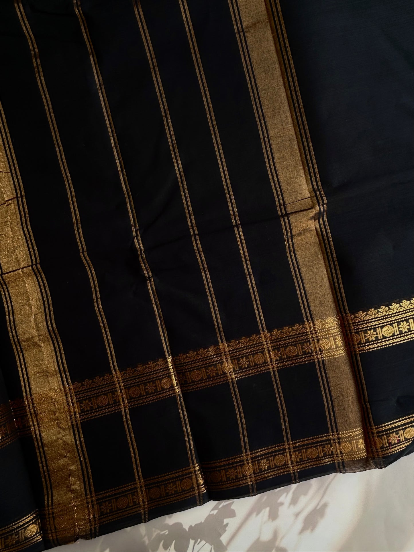 Black Kanchi cotton saree with zari border