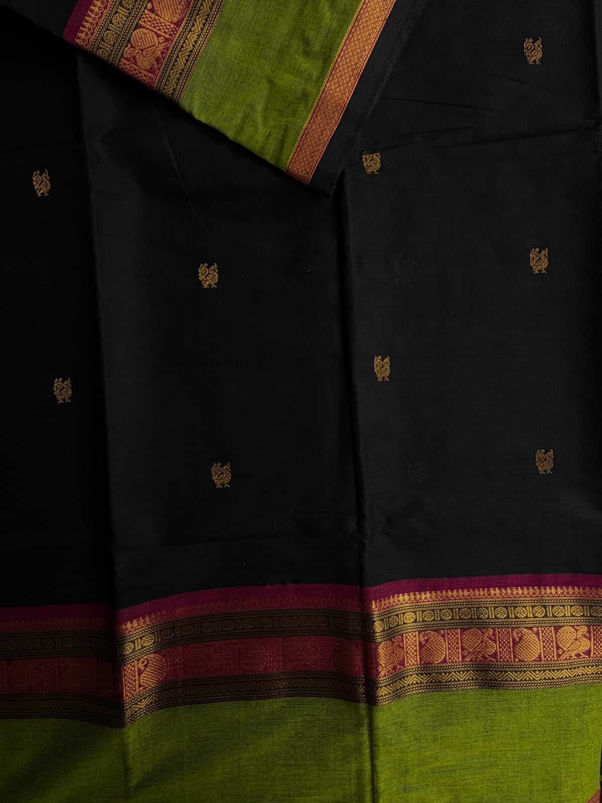 Black Kanchi cotton with annam zari butta weaves & grand pallu