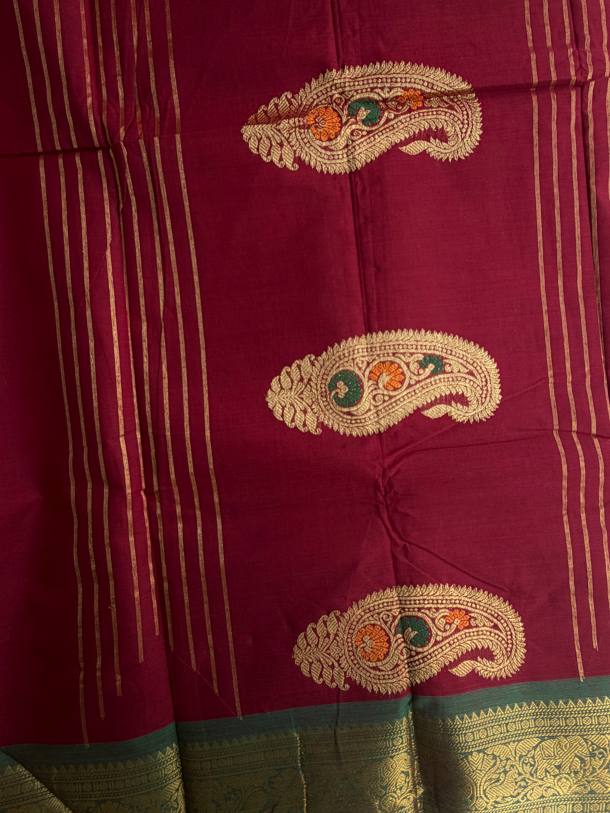 Kanchi cotton saree in butta weaves with grand pallu dark red