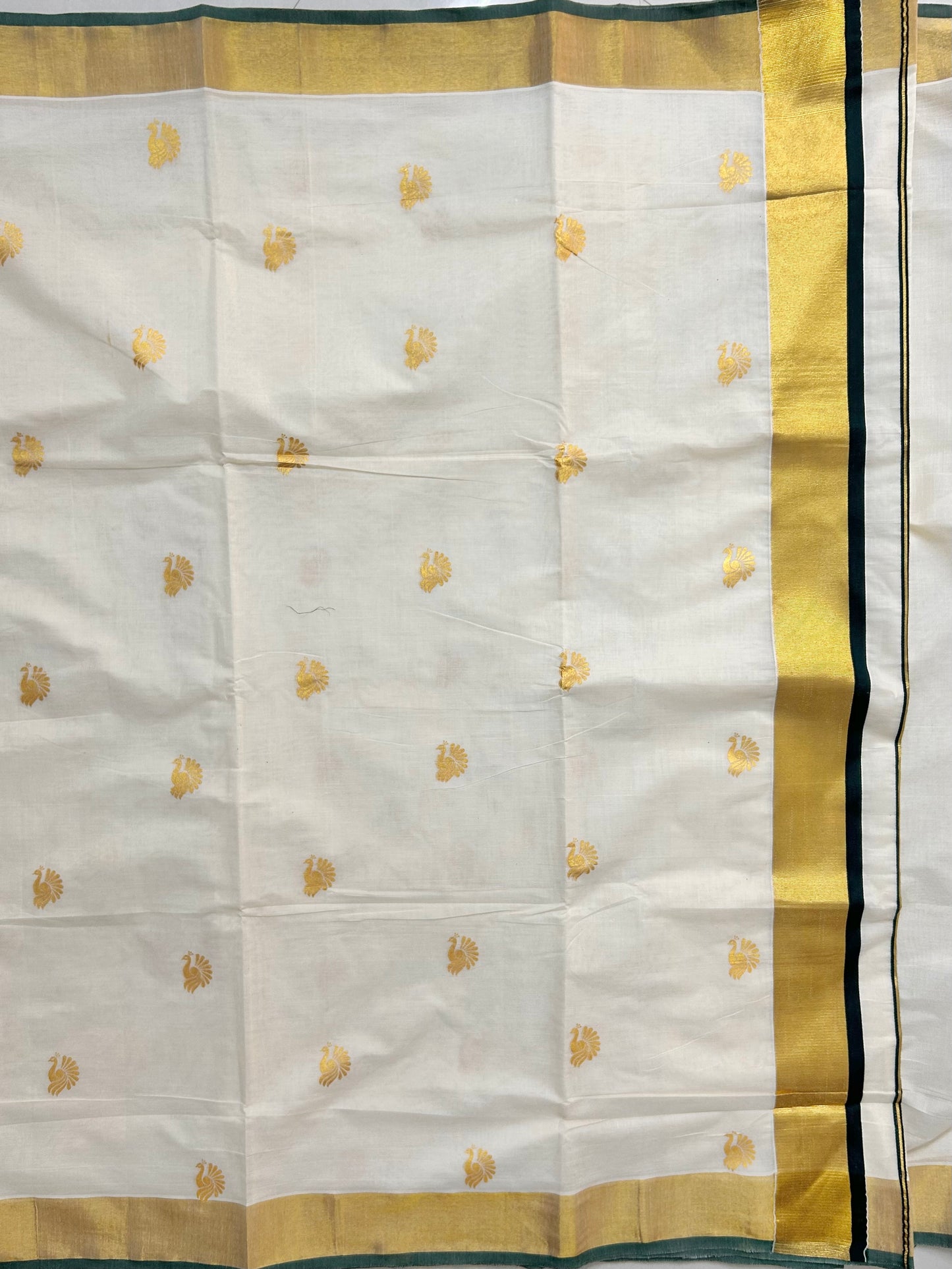 Kasavu saree in peacock print with green border