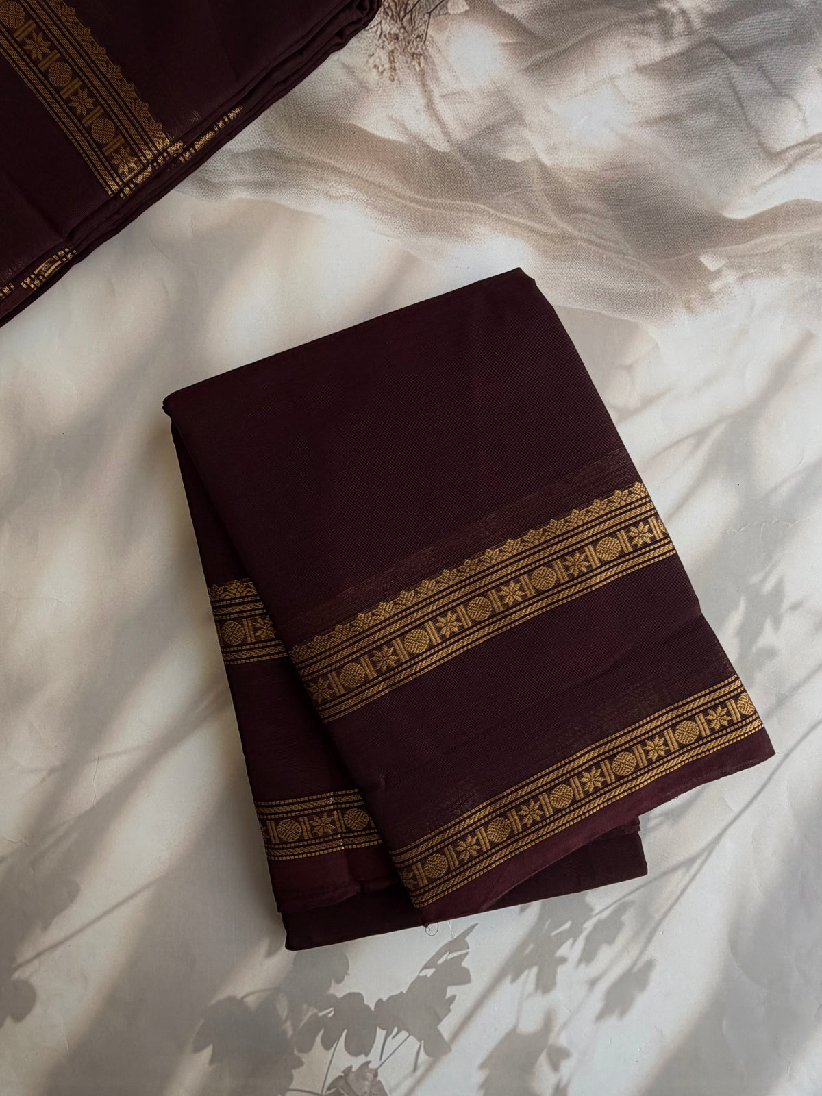 Brown Kanchi cotton saree with zari border