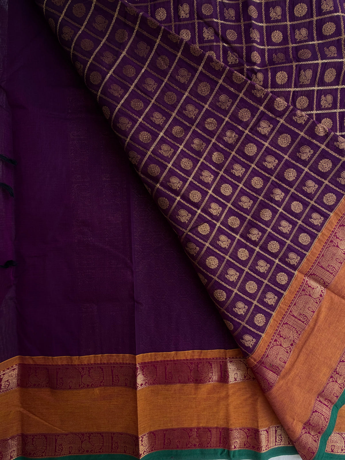 Kanchi cotton saree with 1000 butta & zari check weaves with grand pallu purple