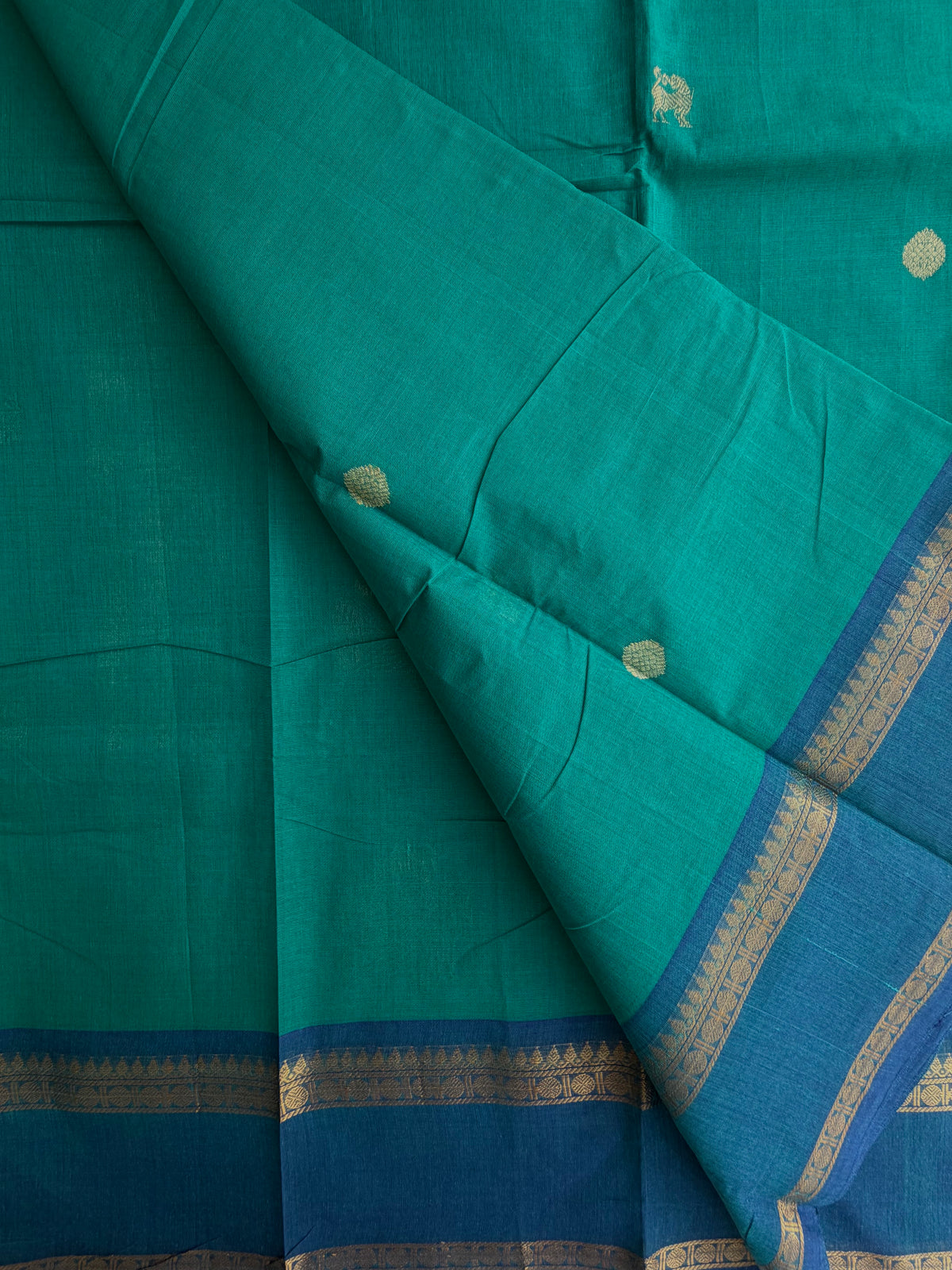 Kanchi cotton saree with butta weaves & zari pallu sky blue
