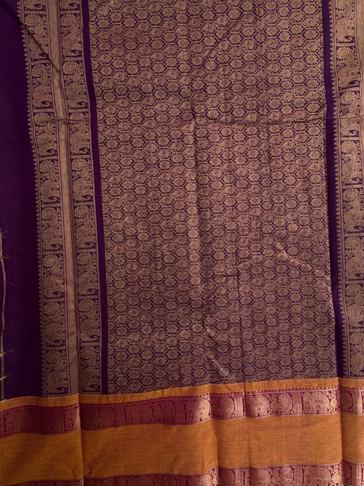 Kanchi cotton saree with 1000 butta & zari check weaves with grand pallu purple