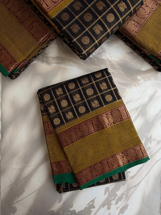 Kanchi cotton saree in zari check & butta weaves in black with a grand pallu