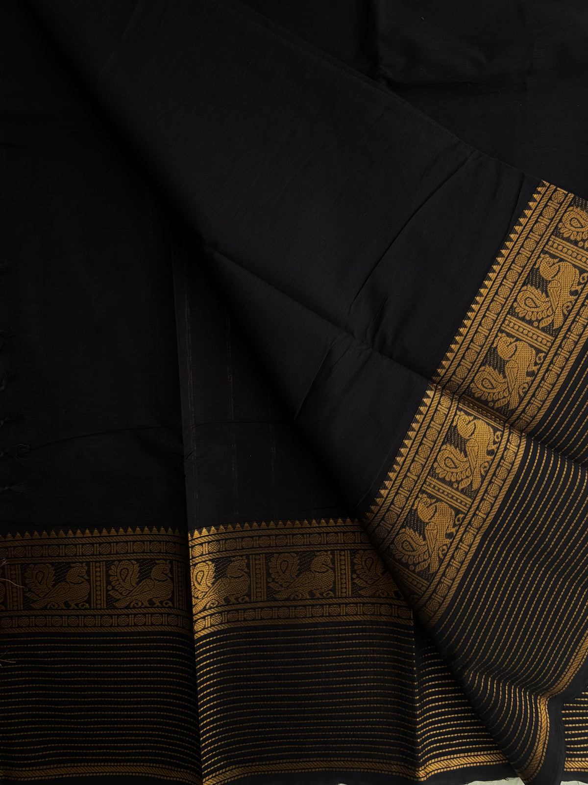 Black Kanchi cotton saree with zari lines border
