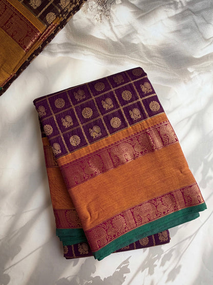 Kanchi cotton saree with 1000 butta & zari check weaves with grand pallu purple