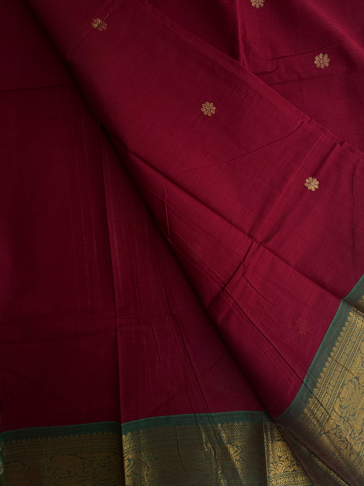 Kanchi cotton saree in butta weaves with grand pallu dark red