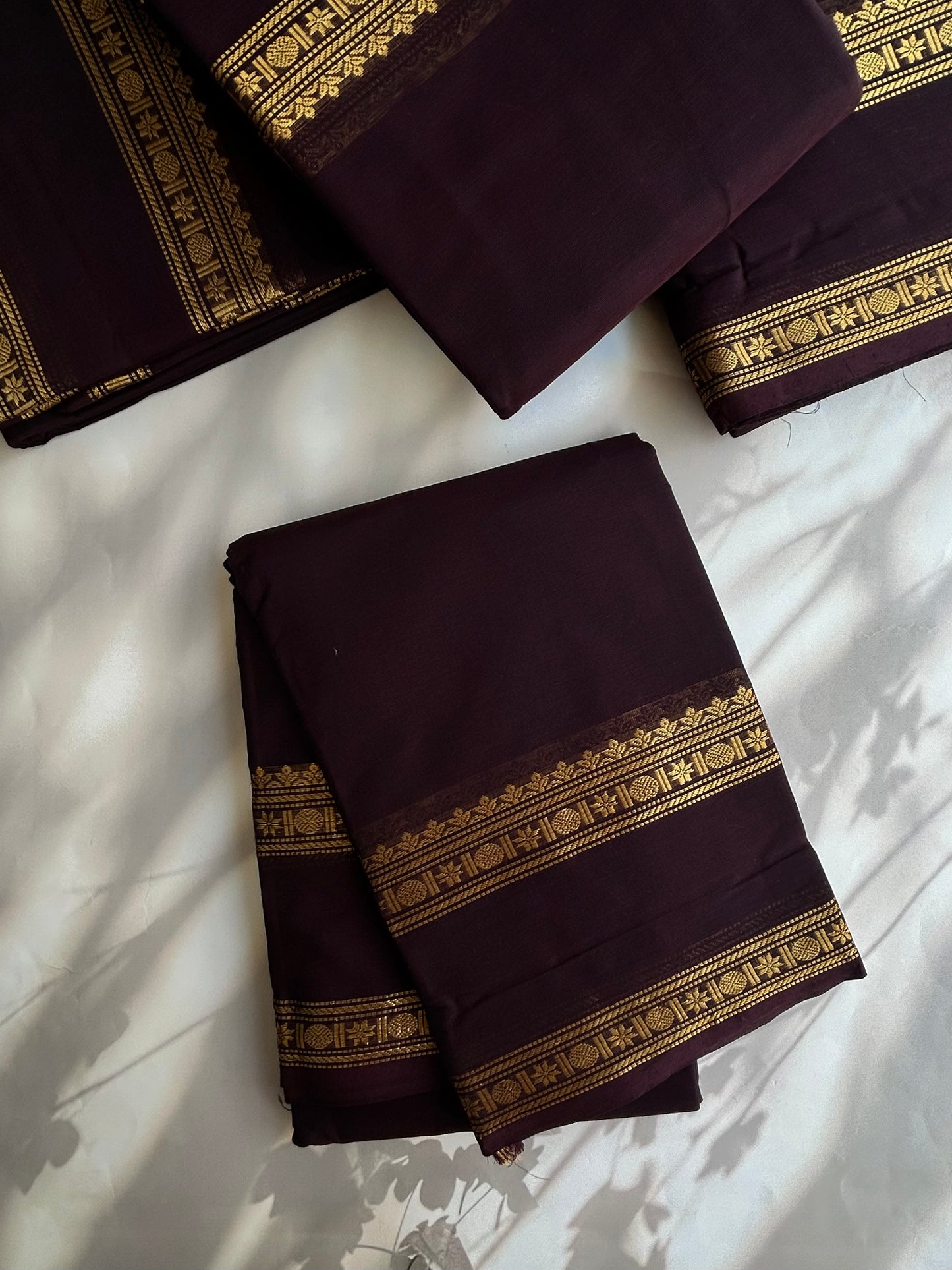 Brown Kanchi cotton saree with zari border