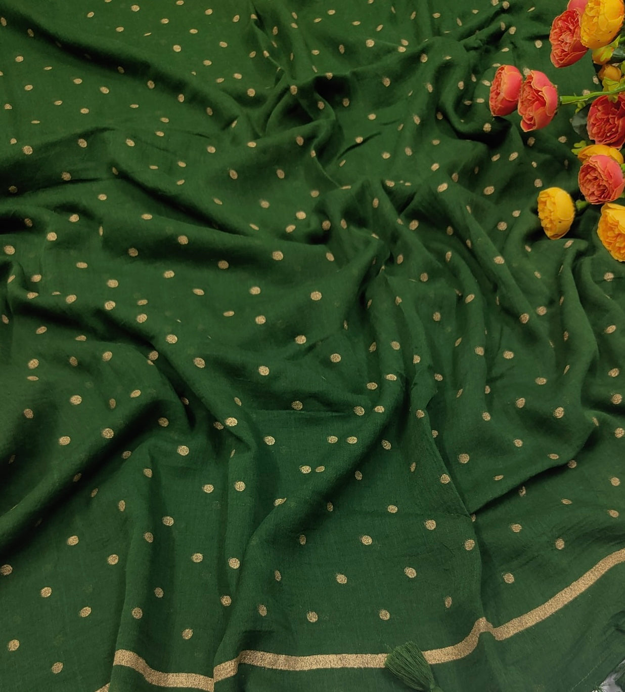 Green Mul mul saree in golden polka dots