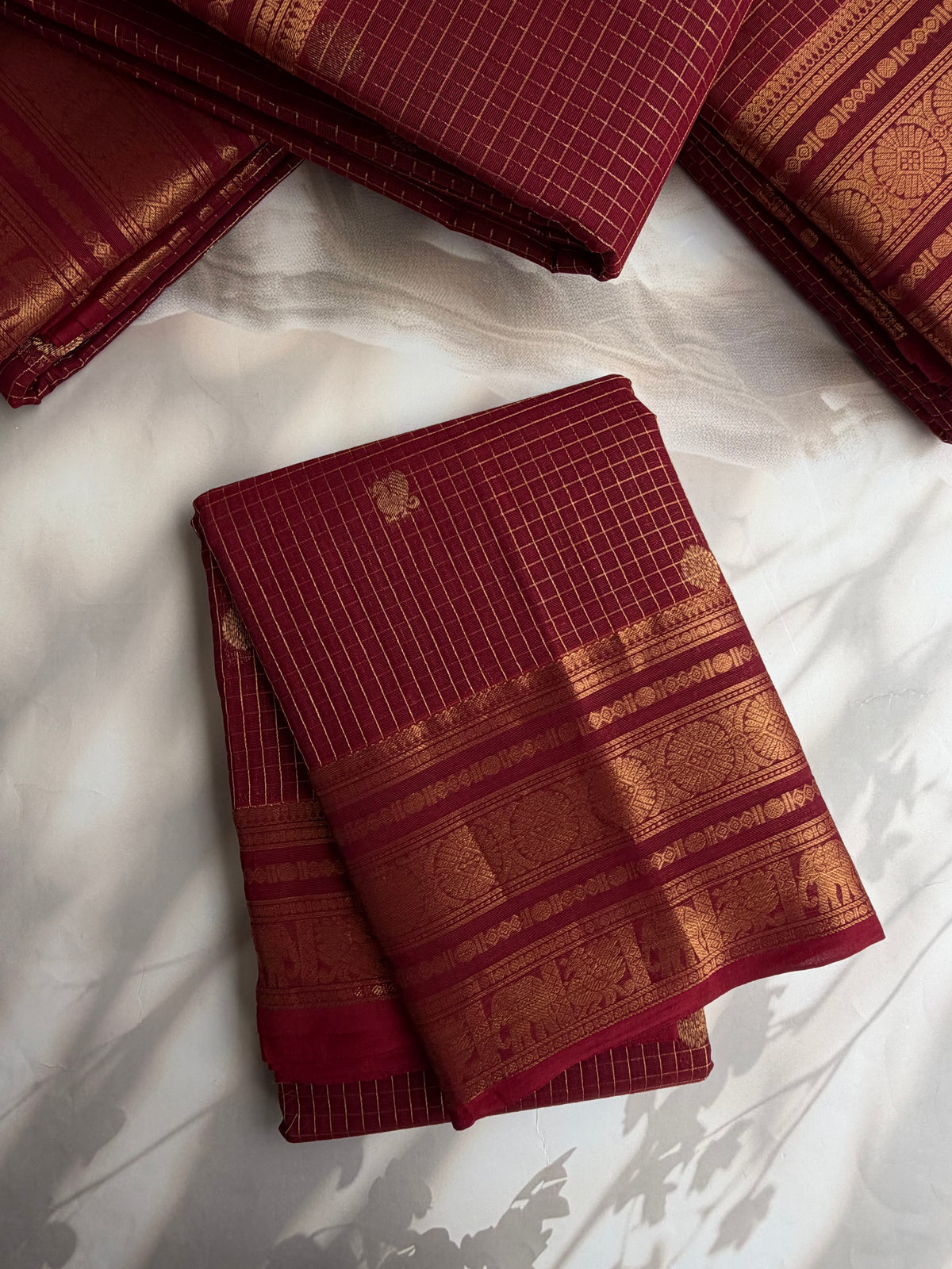 Kanchi cotton saree with kattam weaves & grand pallu maroon