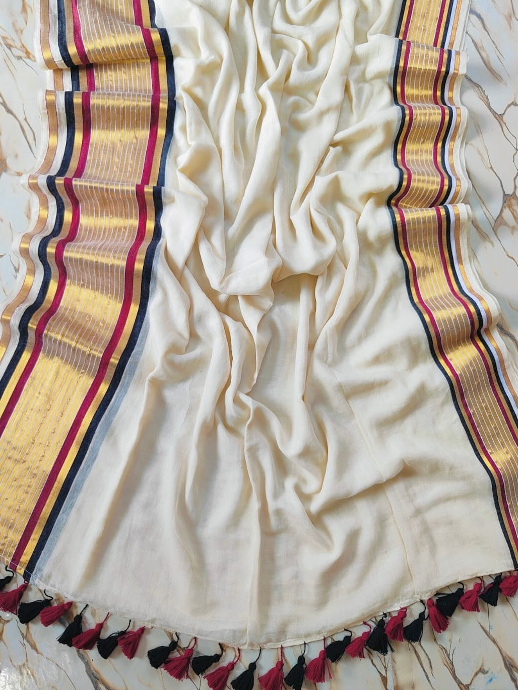 Off white Mul mul saree with zari border