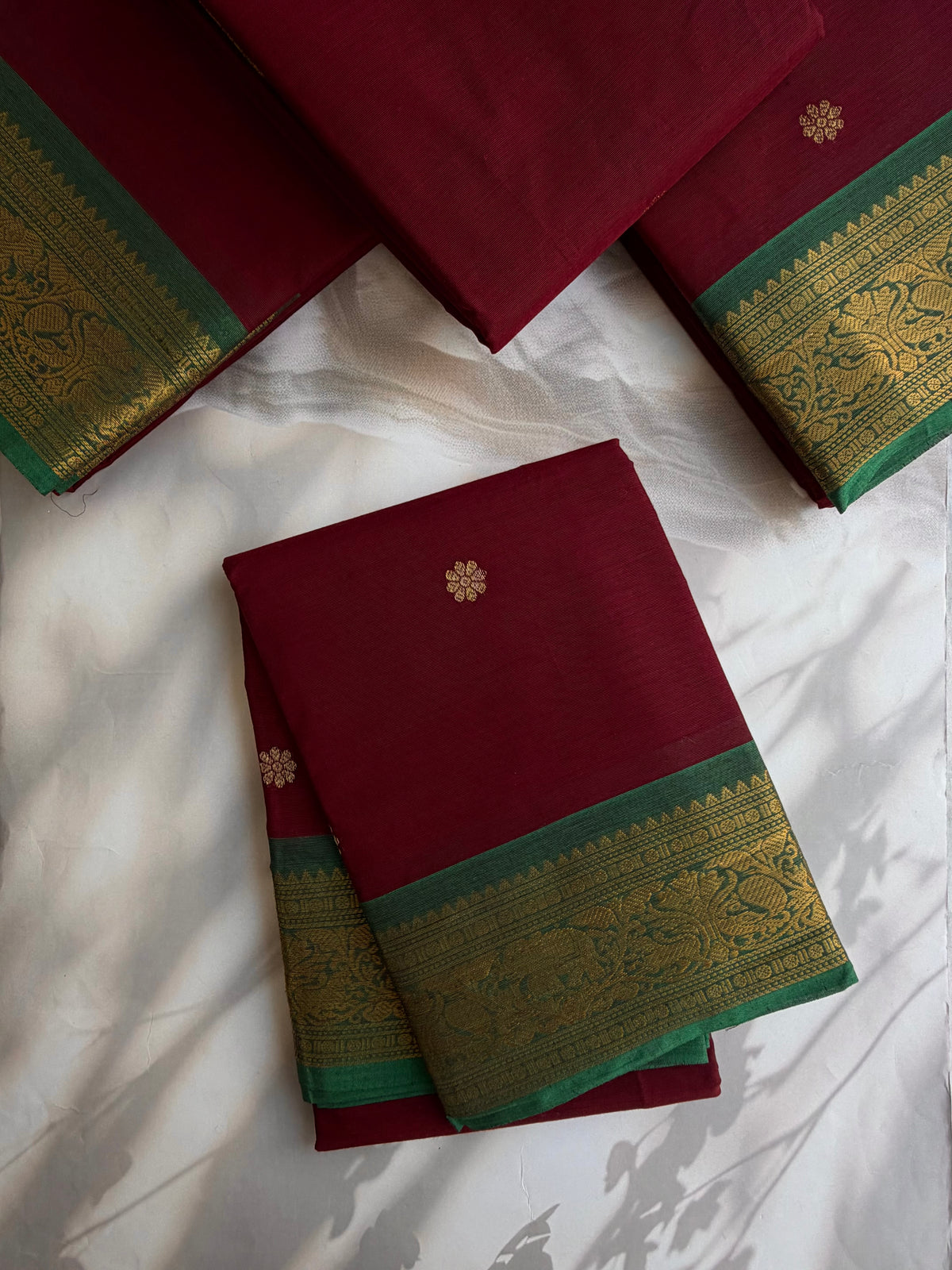 Kanchi cotton saree with zari butta weaves & zari pallu maroon