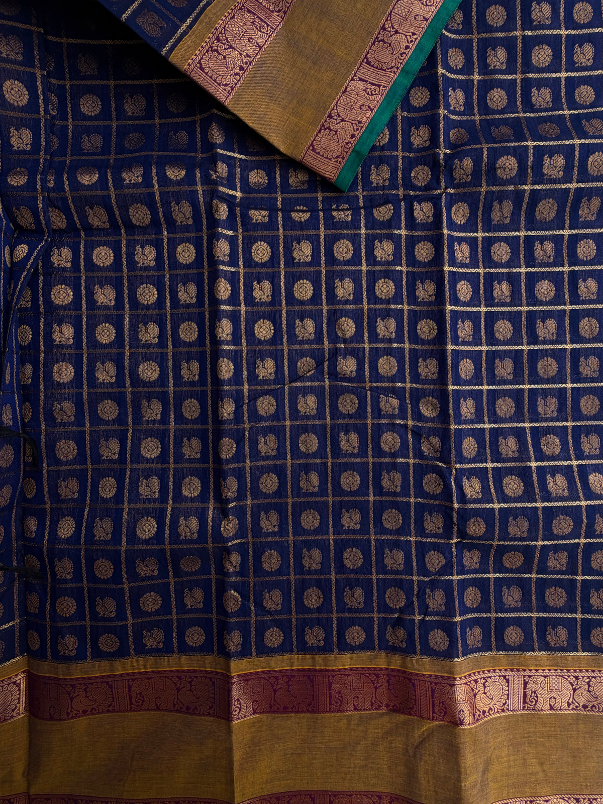 Kanchi cotton saree in 1000 buttas & zari check weaves with grand pallu blue