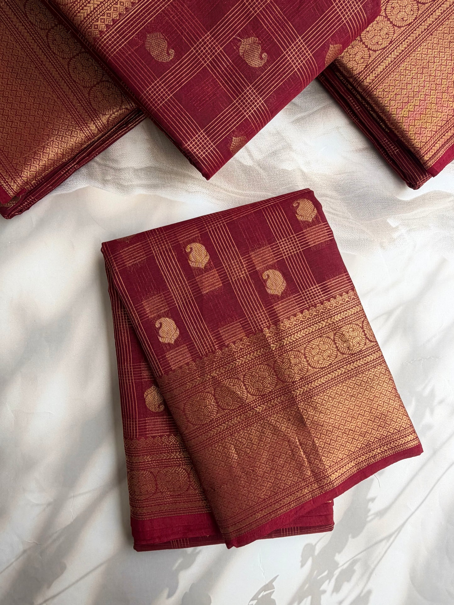 Kanchi cotton saree in checks & butta weaves & grand pallu maroon