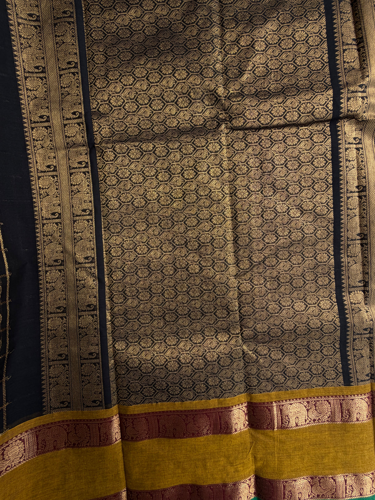 Kanchi cotton saree in zari check & butta weaves in black with a grand pallu