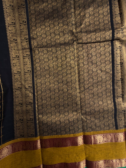 Kanchi cotton saree in zari check & butta weaves in black with a grand pallu