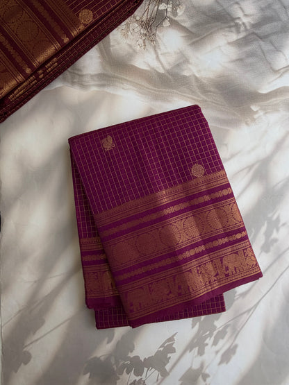 Kanchi cotton saree in checks & butta weaves with a grand pallu - majenta