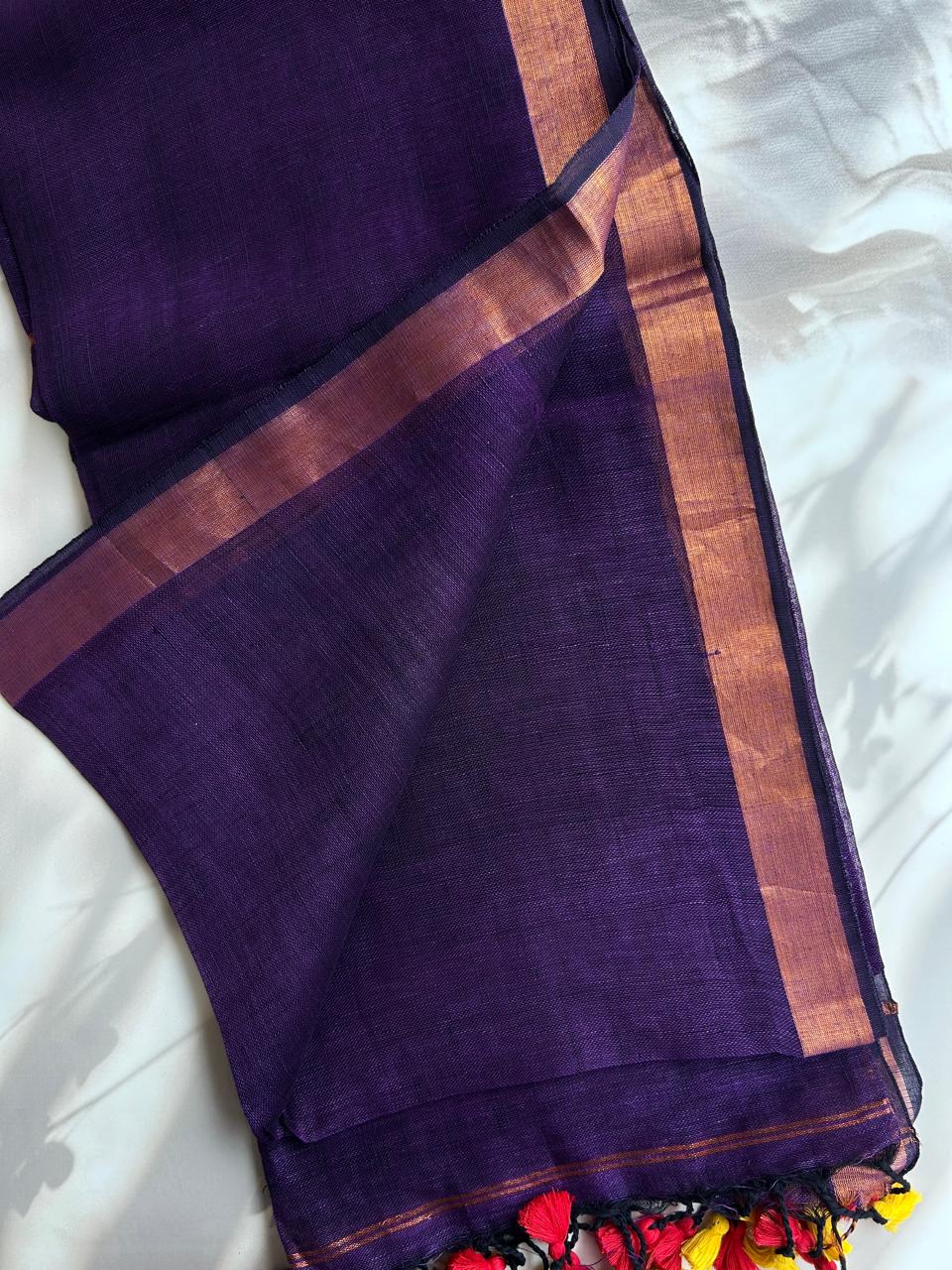Handwoven linen saree with zari border