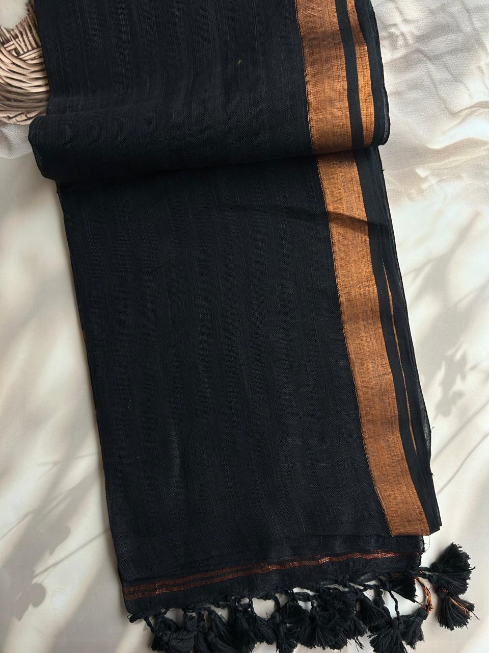 Handwoven linen saree with zari border