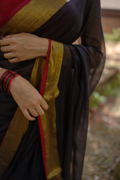 Black Mul mul saree with zari border