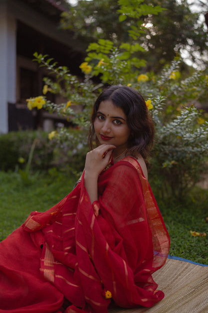 Handwoven linen saree with zari border