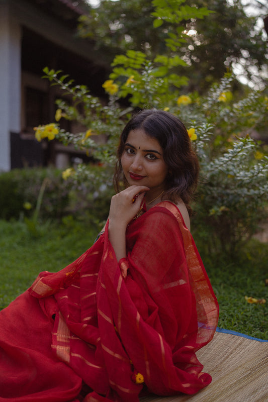 Handwoven linen saree with zari border