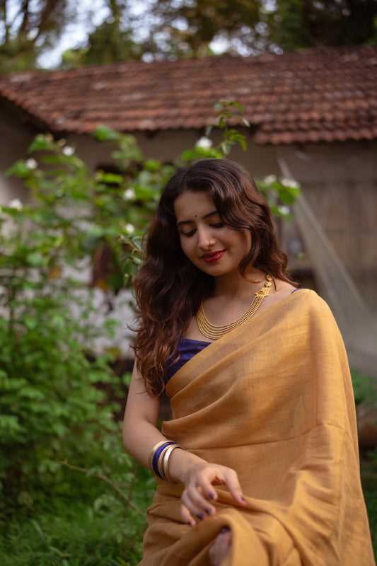 Handloom Tissue linen saree gold