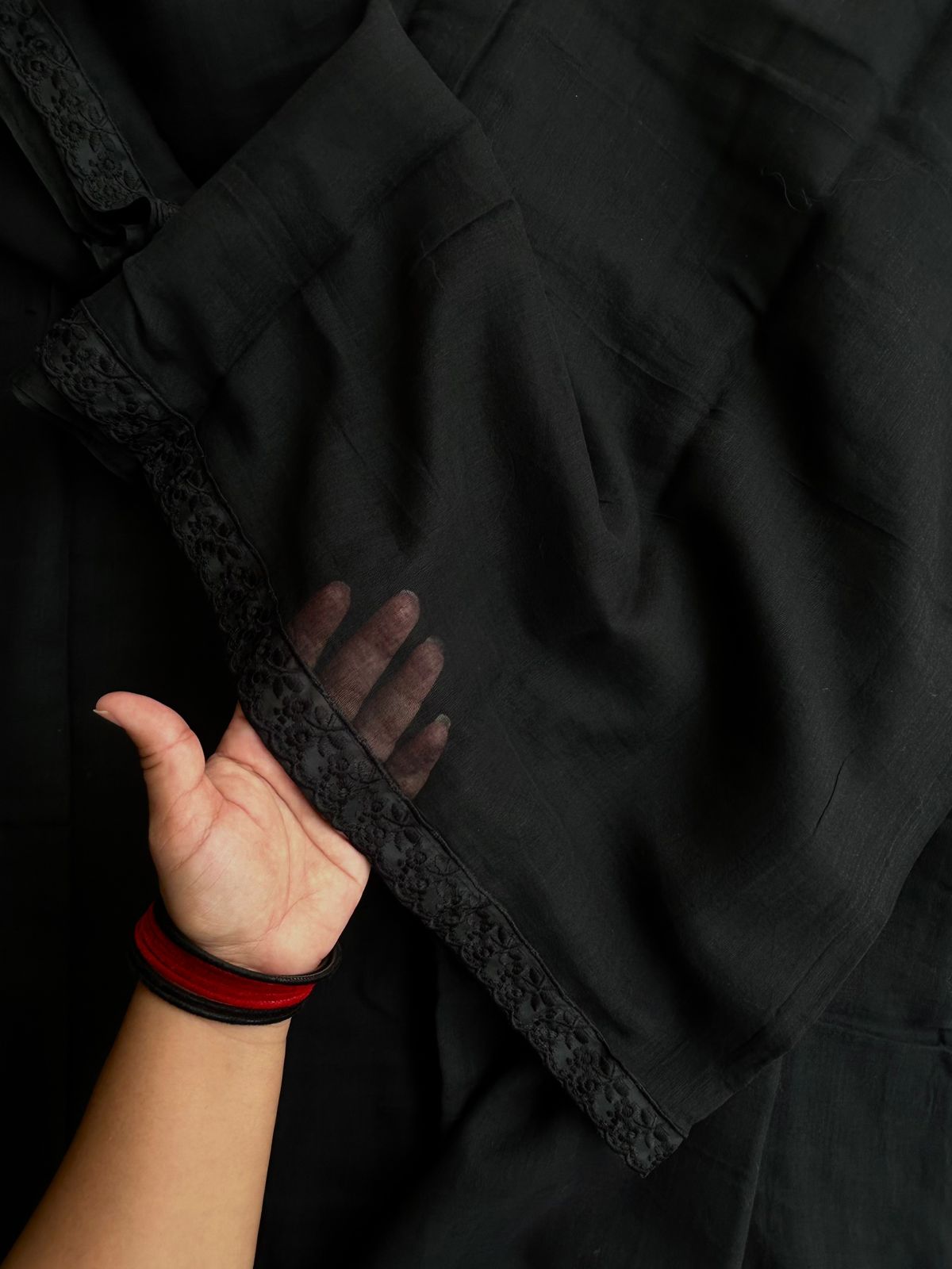 Plain black mul cotton saree with lace border