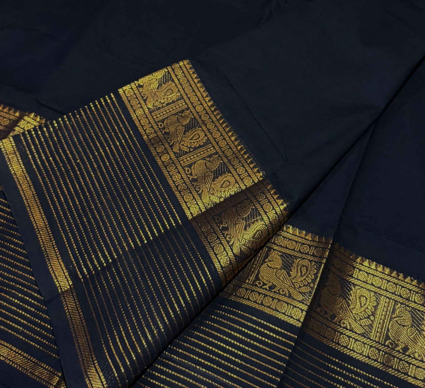 Black Kanchi cotton saree with zari lines border